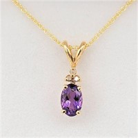 10KT. YELLOW GOLD 6MM X 4MM GENUINE AMETHYTS