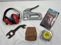 Antique wrench and collection of garage supplies