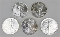 5 1987 One Ounce Fine Silver Eagles.