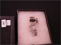 Two pairs of men's sterling cufflinks;