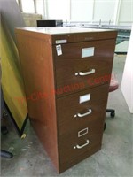 Steelcase 3 drawer file cabinet. Brown woodgrain