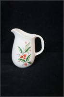 Pottery Pitcher with Flower Design