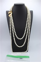 Triple strand faux pearls