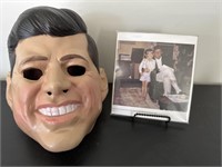 Vintage John F Kennedy mask along photo 1962