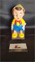 Vintage rubber Pinocchio coin bank