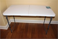 4 Foot Adjustable Height Fold-In-Half Table #4