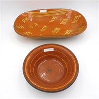 (2) redware yellow slip decorated bowls.