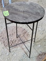 Round glass top end table