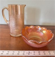 Marigold carnival glass bowl and pitcher