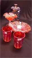 Five pieces of carnival glass: marigold