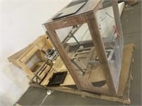 Wooden cabinet parts, drone parts in plexiglass