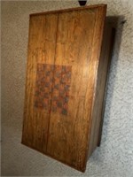 Blanket chest with checkerboard design