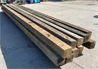 Nine 6" x 6" Treated Timbers 20 feet long. One