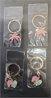 4 new key chain 2 palm tree and 2 flamingo