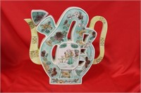 A Chinese Famille Verte Character Teapot