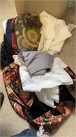 Two ironing boards and miscellaneous cloth items