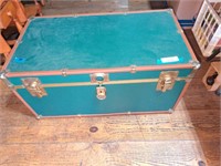 Antique trunk with wheels