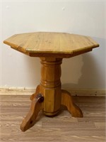 Octagon table. Measures 23 1/2 x  27 inches tall