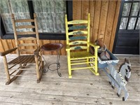 2 Outdoor Rocking Chairs. Table. And Decor