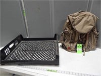 Fieldline camo backpack in a plastic crate
