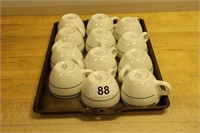 Set of twelve coffeemugs by Homerlaughlin