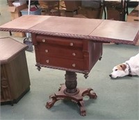 Antique claw foot table with drop sides approx