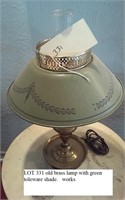 vintage brass lamp w toleware shade.