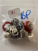 LOT OF STERLING SILVER BEADS / MORE CHARMS