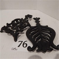 CAST IRON TRIVETS , ONE MARKED "WILTON"