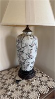 Porcelain table lamp with a bird and floral