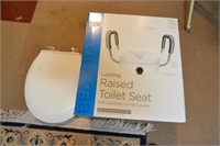 NEW RAISED TOILET SEAT AND PLASTIC TOILET SEAT