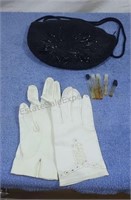 Vintage beaded purse and leather women's gloves.