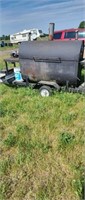 Rotisserie hog cooker on trailer