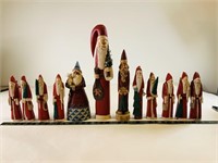 Collection of carved wooden santa Christmas deco