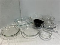 2 Pyrex Glassware With An Assortment Of Clear