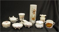 Group various decorative ceramic table pieces