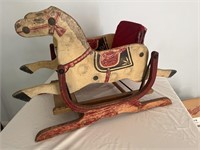 Primitive carved and painted wooden rocking horse