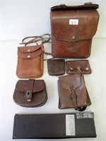 Six vintage leather pouches & ticket dispenser
