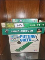 4 GOLF RELATED ITEMS- PUTTING GREEN SWING