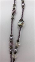 Purple Beaded Necklace With Purple Leaf Shapes At