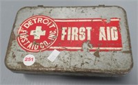 Detroit First Aid metal box with some contents.