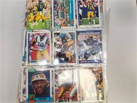 Stack of Assorted Football Cards In Binder Sheets
