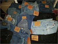 15 pair of Levi Strauss blue jeans pants and