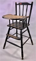 Maple high chair, painted black, has tray and foot