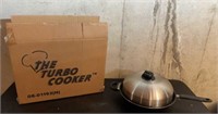 The Turbo  Cooker , one in box , one not in box