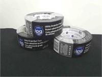 Three new rolls of utility grade duct tape