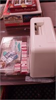 Memory Craft sewing machine in case and a box