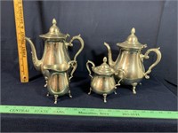 Assortment of teapots & creamer