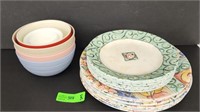 Corelle Plates and plastic bowls.