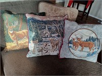 Lot of three deer motif throw pillows